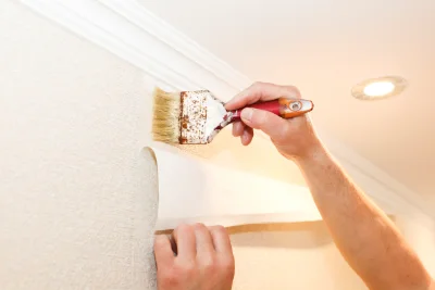 Pose de papier peint à Aigne — revêtements muraux et toiles de verre